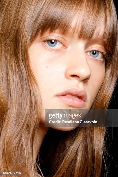 Model poses in the backstage of the Ermanno Scervino fashion show during the Milan Fashion Week - Spring / Summer 2022 on September 25, 2021 in...