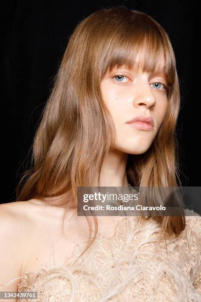 Model poses in the backstage of the Ermanno Scervino fashion show during the Milan Fashion Week - Spring / Summer 2022 on September 25, 2021 in...