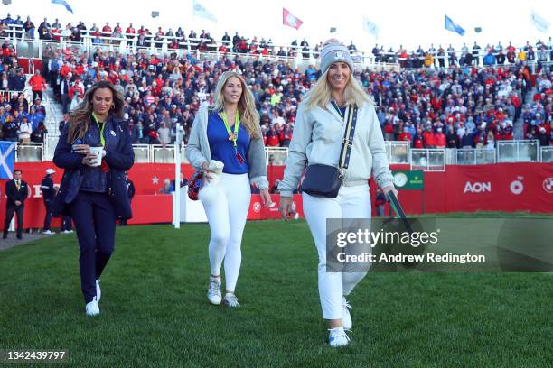 Caroline Harrington and Kelley Cahill walk across the first tee during Saturday Morning Foursome Matches of the 43rd Ryder Cup at Whistling Straits...