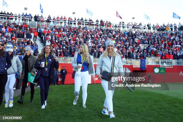 Caroline Harrington and Kelley Cahill walk across the first tee during Saturday Morning Foursome Matches of the 43rd Ryder Cup at Whistling Straits...