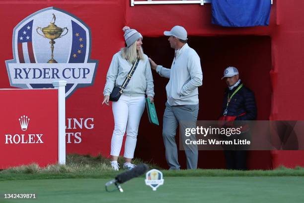 Captain Padraig Harrington of Ireland and team Europe and wife Caroline Harrington meet on the first tee during Saturday Morning Foursome Matches of...