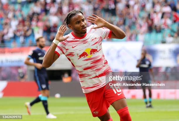 Christopher Nkunku of RB Leipzig celebrates scoring his sides first goal during the Bundesliga match between RB Leipzig and Hertha BSC at Red Bull...