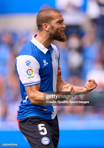 Victor Laguardia of Deportivo Alaves celebrates victory after the La Liga Santander match between Deportivo Alaves and Club Atletico de Madrid at...