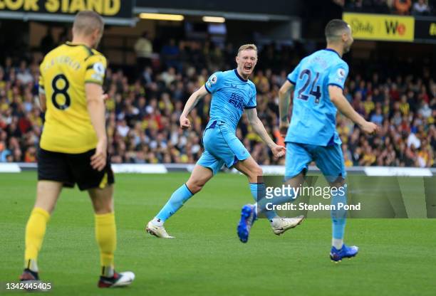 Sean Longstaff of Newcastle United celebrates scoring his sides first goal during the Premier League match between Watford and Newcastle United at...