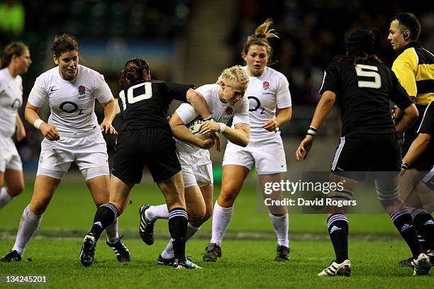 Tamara Taylor of England is tackled by Rebecca Mahoney of New Zealand during the Women's Rugby Union International match bertween England and New...