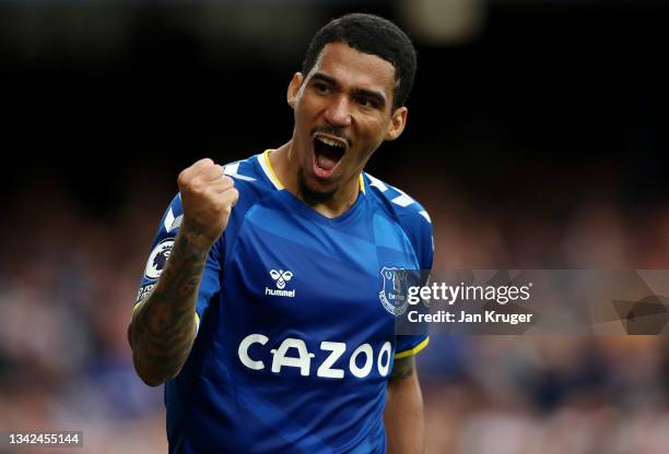 Allan of Everton celebrates their side's second goal scored by Abdoulaye Doucoure of Everton during the Premier League match between Everton and...