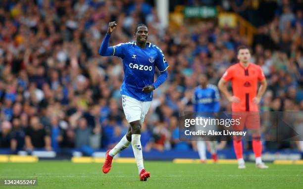 Abdoulaye Doucoure of Everton celebrates after scoring their side's second goal during the Premier League match between Everton and Norwich City at...