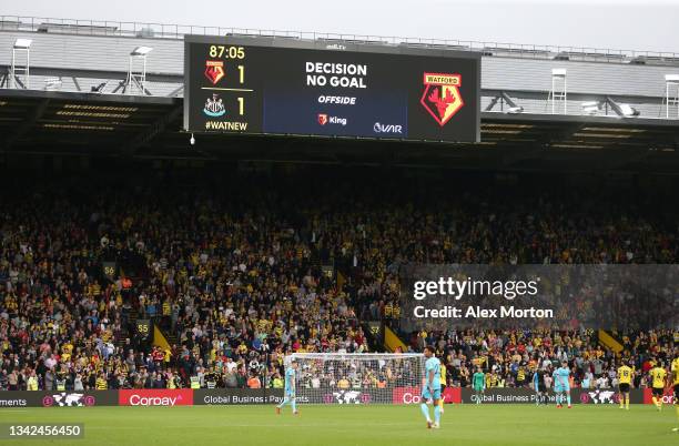 General view inside the stadium where the big screen displays a VAR no goal decision during the Premier League match between Watford and Newcastle...