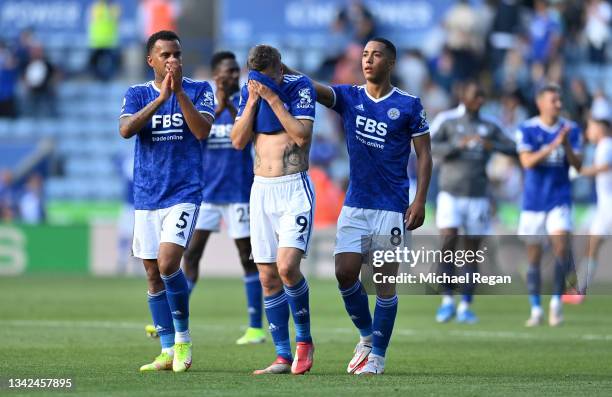 Jamie Vardy of Leicester City looks dejected as he is consoled by Ryan Bertrand and Youri Tielemans after the Premier League match between Leicester...