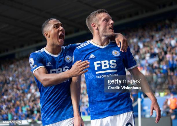 Jamie Vardy of Leicester City celebrates scoring his first goal with team mate Youri Tielemans during the Premier League match between Leicester City...