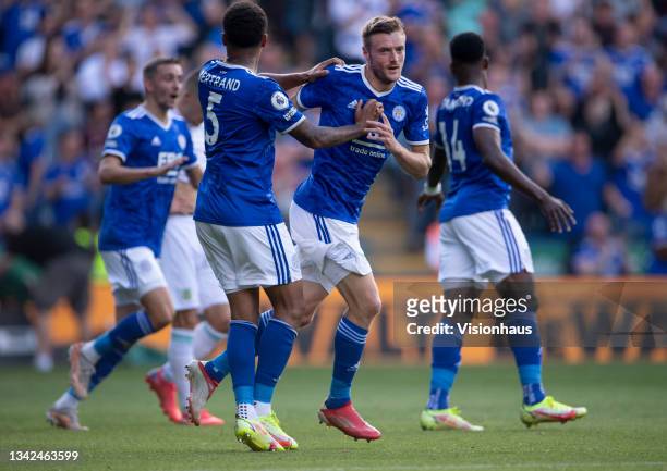 Jamie Vardy of Leicester City celebrates scoring his second goal with team mate Ryan Bertrand during the Premier League match between Leicester City...