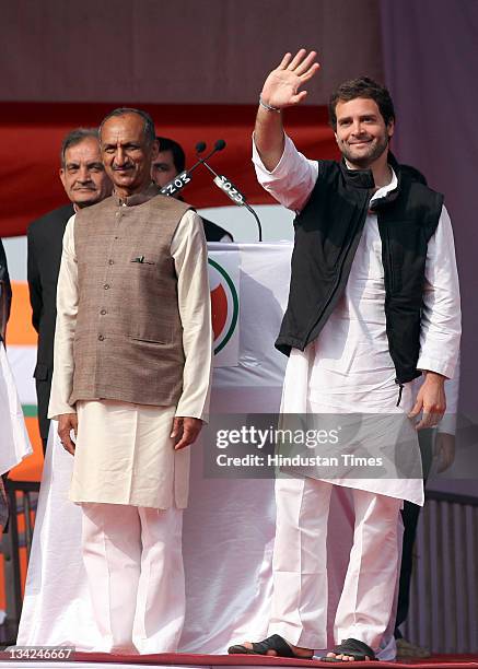 General Secretary Rahul Gandhi stand with DPCC President JP Aggarwal as he addresses the Youth party's national level convention of elected office...