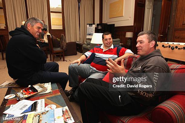 Dean Ryan coach of the Northern Hemisphere team and Nick Mallett coach of the Southern Hemisphere team talk to corporal Simon Brown during the Help...
