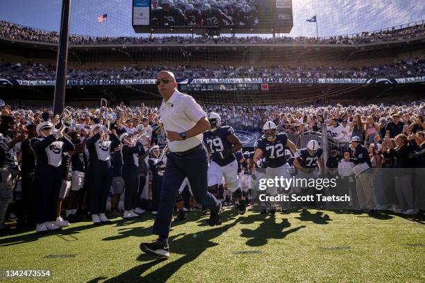 Head coach James Franklin of the Penn State Nittany Lions leads his team onto the field before the game against the Villanova Wildcats at Beaver...