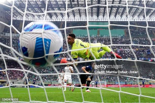 Lautaro Martinez of FC Internazionale scores his team's first goal during the Serie A match between FC Internazionale and Atalanta BC at Stadio...