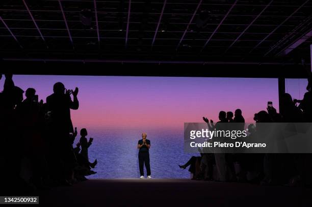 Fashion designer Giorgio Armani acknowledges the applause of the audience at the Giorgio Armani fashion show during the Milan Fashion Week - Spring /...