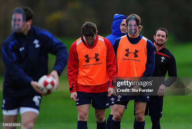 Wales winger Shane Williams shares a joke with his team mates who all wore Shane Williams masks at Wales training to mark 'Shane Williams day' ahead...