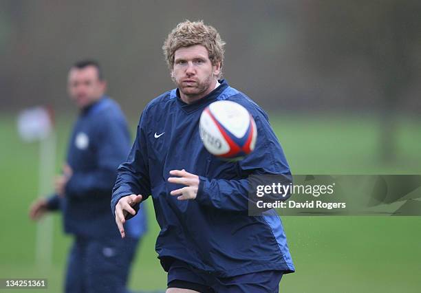 Adam Thomson of the Southern Hemisphere team passes the ball during the Help for Heroes Rugby Challenge training session held at Tedworth House on...