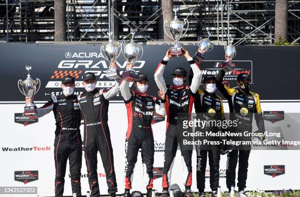 Sportscar race, winners 1st-3rd, on day two of the Acura Grand Prix of Long Beach in Long Beach on Saturday, September 25, 2021.