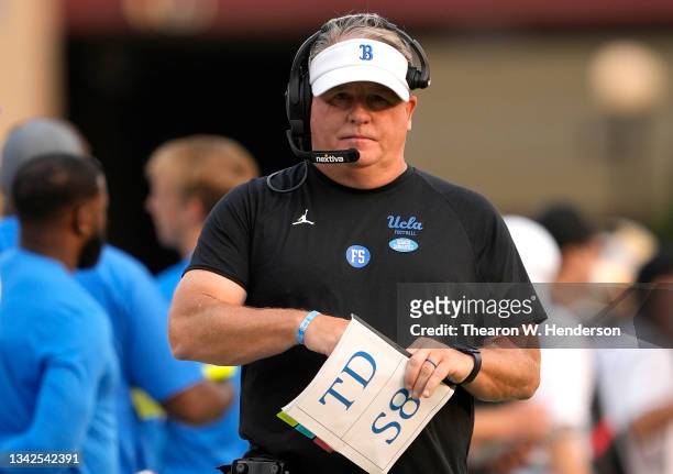 Head coach Chip Kelly of the UCLA Bruins looks on from the sidelines against the Stanford Cardinal during the third quarter of an NCAA football game...