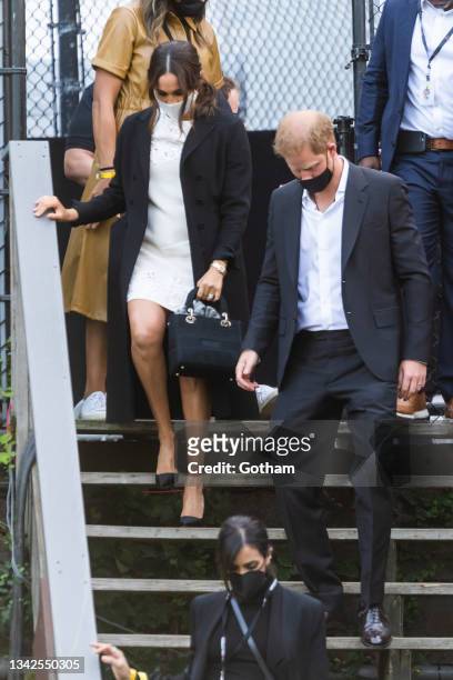 Meghan Markle, Duchess of Sussex, and Prince Harry, Duke of Sussex, depart the Global Citizen concert in Central Park on September 25, 2021 in New...