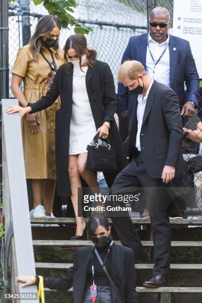Meghan Markle, Duchess of Sussex, and Prince Harry, Duke of Sussex, depart the Global Citizen concert in Central Park on September 25, 2021 in New...