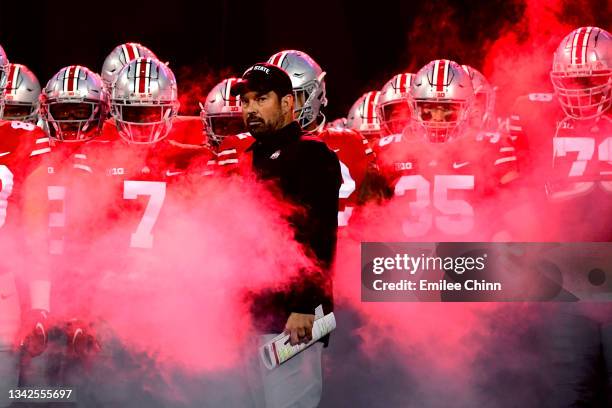 Ohio State Buckeyes head coach Ryan Day prepares to lead his team onto the field prior to a game against the Akron Zips at Ohio Stadium on September...