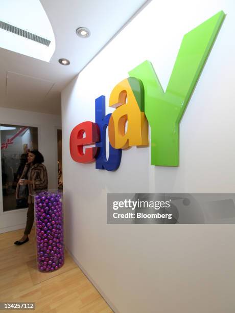 The EBay Inc. Company logo hangs inside the company's Christmas "pop-up" store, in London, U.K., on Tuesday, Nov. 29, 2011. Amazon.com Inc. And EBay...