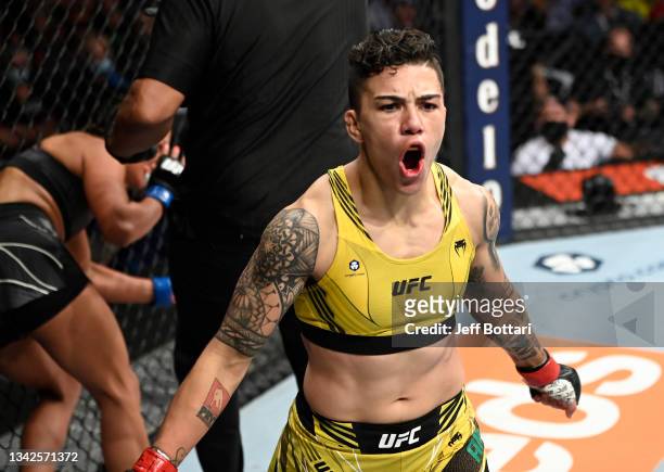 Jessica Andrade of Brazil celebrates her win over Cynthia Calvillo in their flyweight fight during the UFC 266 event on September 25, 2021 in Las...