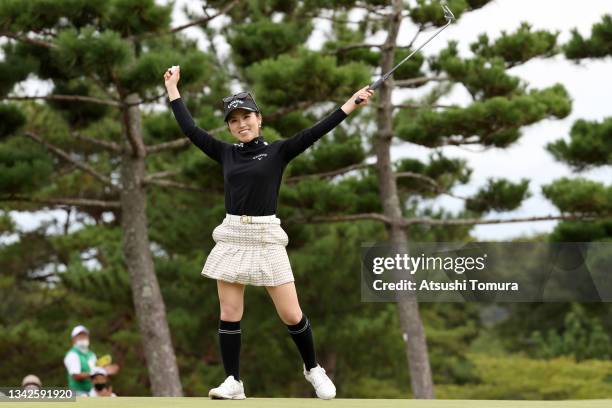 Yuna Nishimura of Japan celebrates winning the tournament on the 18th green during the final round of the Miyagi TV Cup Dunlop Ladies Open at Rifu...