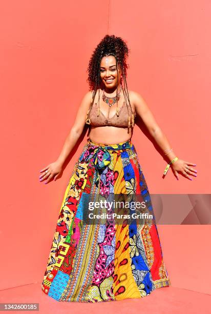 An attendee poses for a photo during day 1 of 2021 AfroPunk Atlanta at Atlantic Station Pinnacle on September 25, 2021 in Atlanta, Georgia.