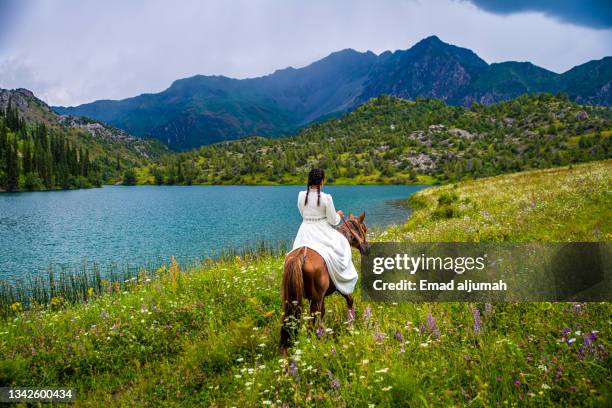 amazing iyri-kol lake in sary-chelek nature reserve, jalal-abad province, kyrgyzstan - kyrgyzstan people stock pictures, royalty-free photos & images