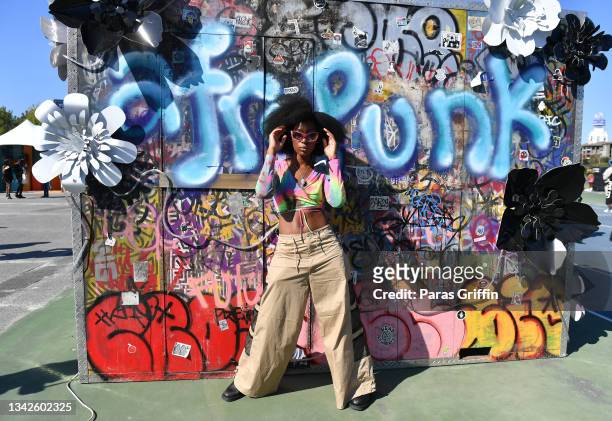 An attendee poses for a photo during day 1 of 2021 AfroPunk Atlanta at Atlantic Station Pinnacle on September 25, 2021 in Atlanta, Georgia.