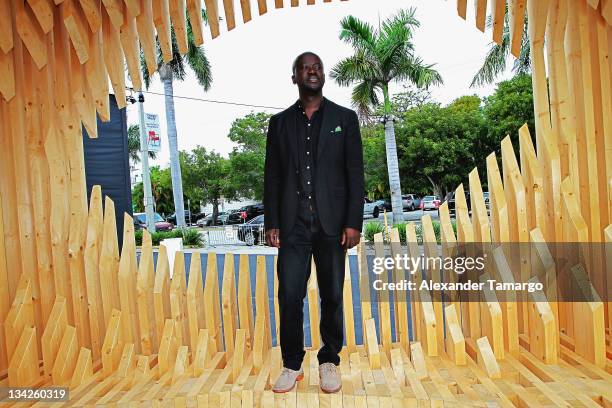 Portrait of David Adjaye with Genesis at the Miami Beach Convention Center on November 29, 2011 in Miami Beach, Florida.