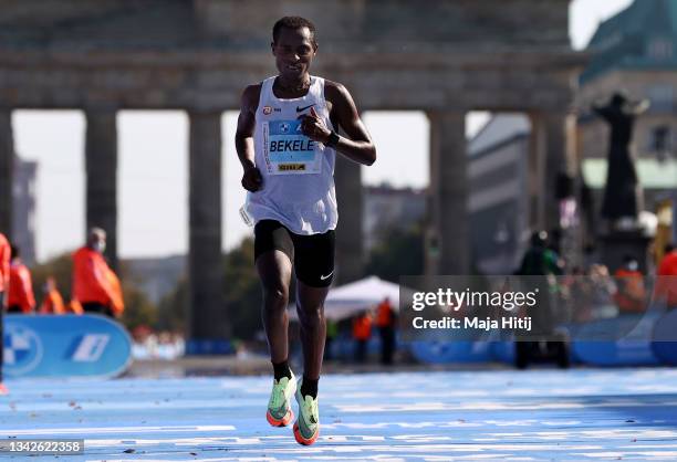 Kenenisa Bekele of Ethiopia finishes in third place in the Men's Elite race during the 47th Berlin Marathon 2021 on September 26, 2021 in Berlin,...