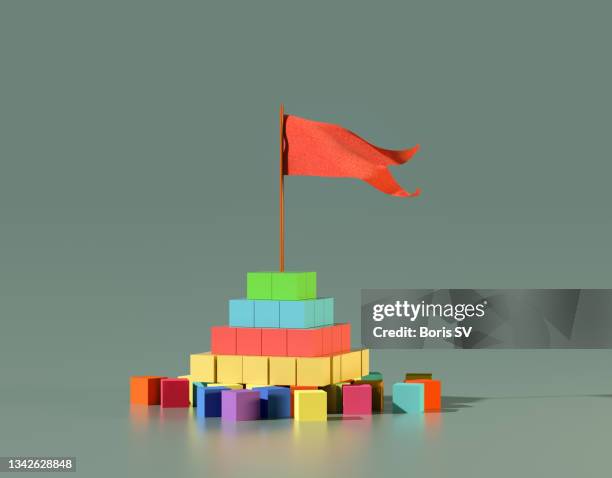 pyramid made from blocks - leaders summit stock pictures, royalty-free photos & images