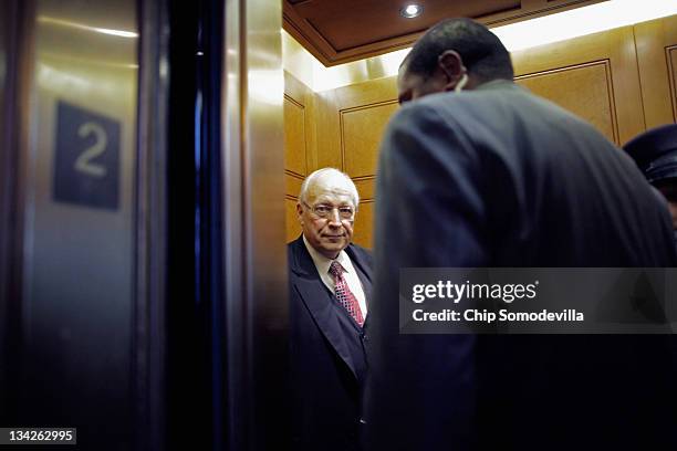 Former U.S. Vice President Dick Cheney boards an elevator after leaving the Senate Republican policy luncheon at the U.S. Capitol November 29, 2011...