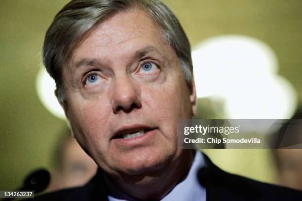Senate Armed Services Committee members U.S. Sen. Lindsey Graham talks to the press after the weekly Senate Republican policy luncheon at the U.S....