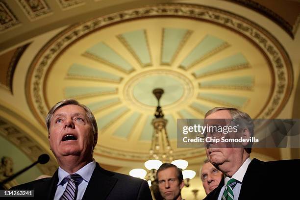 Senate Armed Services Committee members U.S. Sen. Lindsey Graham talks to the press after the weekly Senate Republican policy luncheon with Senate...