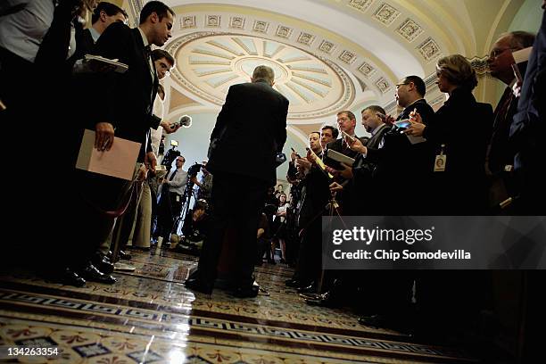 Senate Majority Leader Harry Reid answers reporters' questions after the weekly Senate Democratic policy luncheon at the U.S. Capitol November 29,...