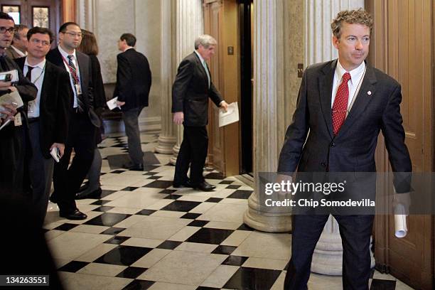 Sen. Rand Paul leaves the weekly Senate Republican policy luncheon at the U.S. Capitol November 29, 2011 in Washington, DC. The Senate Democratic and...