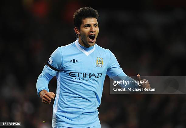 Sergio Aguero of Manchester City celebrates as he scores their first goal during the Carling Cup Quarter Final match between Arsenal and Manchester...