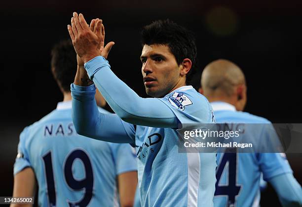 Sergio Aguero of Manchester City celebrates as he scores their first goal during the Carling Cup Quarter Final match between Arsenal and Manchester...