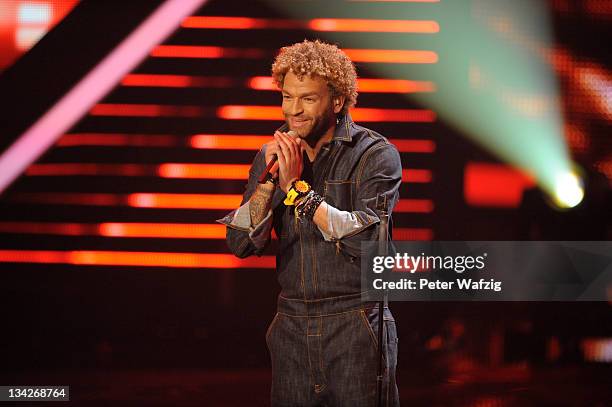 Rufus Martin performs his first song on stage during 'The X Factor Live' Semifinal TV-Show on November 29, 2011 in Cologne, Germany.