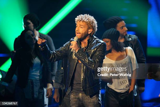 Rufus Martin performs his second song on stage during 'The X Factor Live' Semifinal TV-Show on November 29, 2011 in Cologne, Germany.