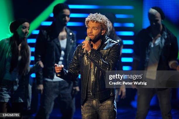 Rufus Martin performs his second song on stage during 'The X Factor Live' Semifinal TV-Show on November 29, 2011 in Cologne, Germany.
