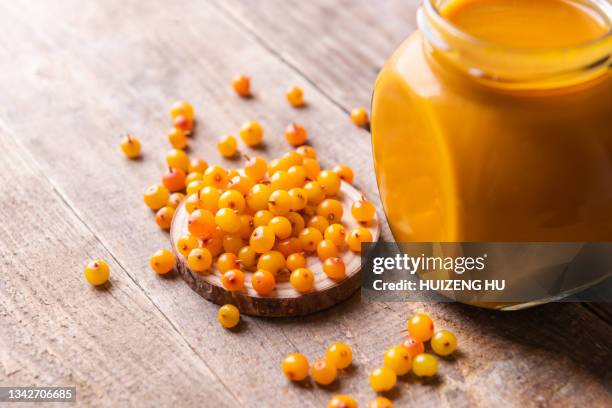 fresh sea buckthorn fruit jam - buckthorn stock pictures, royalty-free photos & images