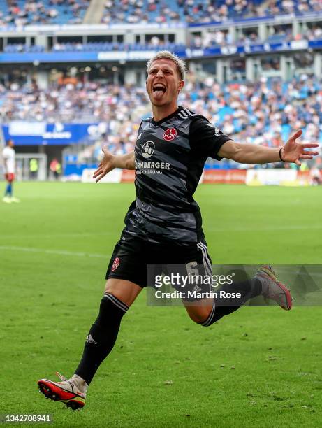 Lino Tempelmann of Nürnberg celebrates after scoring his team's second goal during the Second Bundesliga match between Hamburger SV and 1. FC...