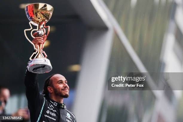 Lewis Hamilton of Mercedes and Great Britain celebrates winning his 100th Grand Prix during the F1 Grand Prix of Russia at Sochi Autodrom on...