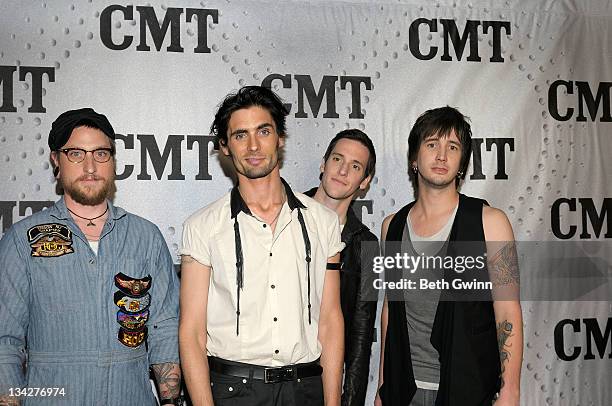 Nick Wheeler, Tyson Ritter, Mike Kennerly and Chris Gaylor of The All-American Rejects attends CMT Artists of the Year 2011 at the Bridgestone Arena...